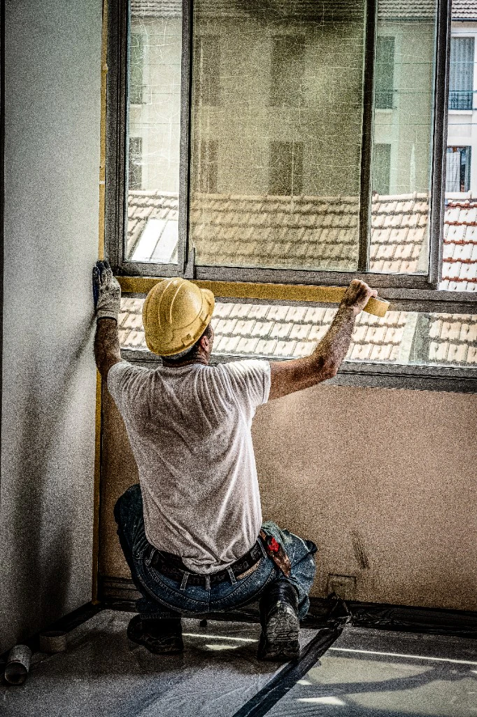 Window installation on construction site